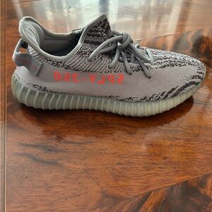 Authentic Adidas Yeezy Boost 350 V2 Grey Knit Sneaker with Orange Accents. AH